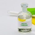 White vinegar in a bottle ready for cleaning.