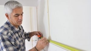 measure and prepare space when installing cabinets