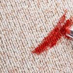 red lipstick on carpet